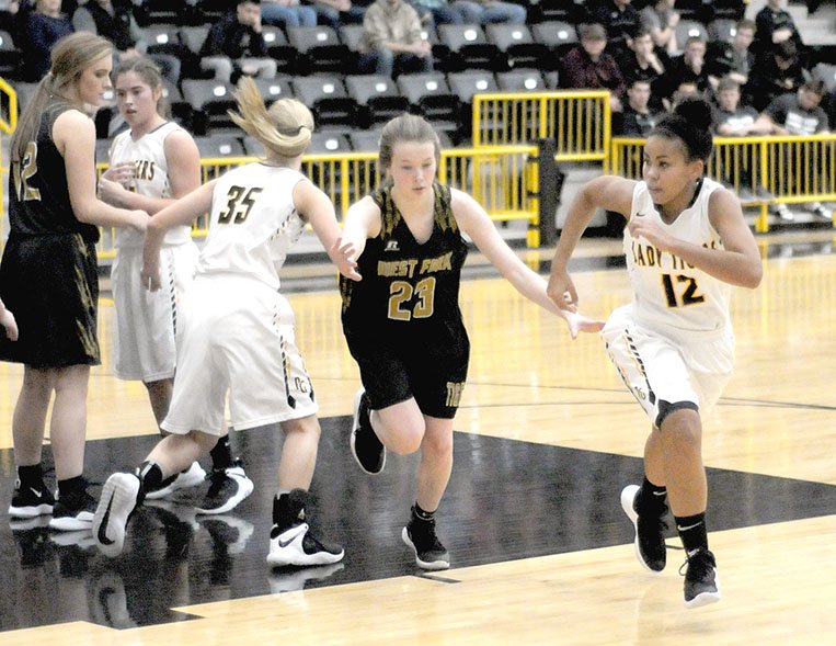MARK HUMPHREY ENTERPRISE-LEADER Moving without the ball becomes crucial during in-bounds plays such as this with Prairie Grove senor Larisha Crawford breaking to the wing against West Fork. If the ball is not in-bounded within 5 seconds a violation occurs and possession reverts to the opponent. The Lady Tigers handed West Fork a 45-28 defeat on Friday, Dec. 7, 2018.
