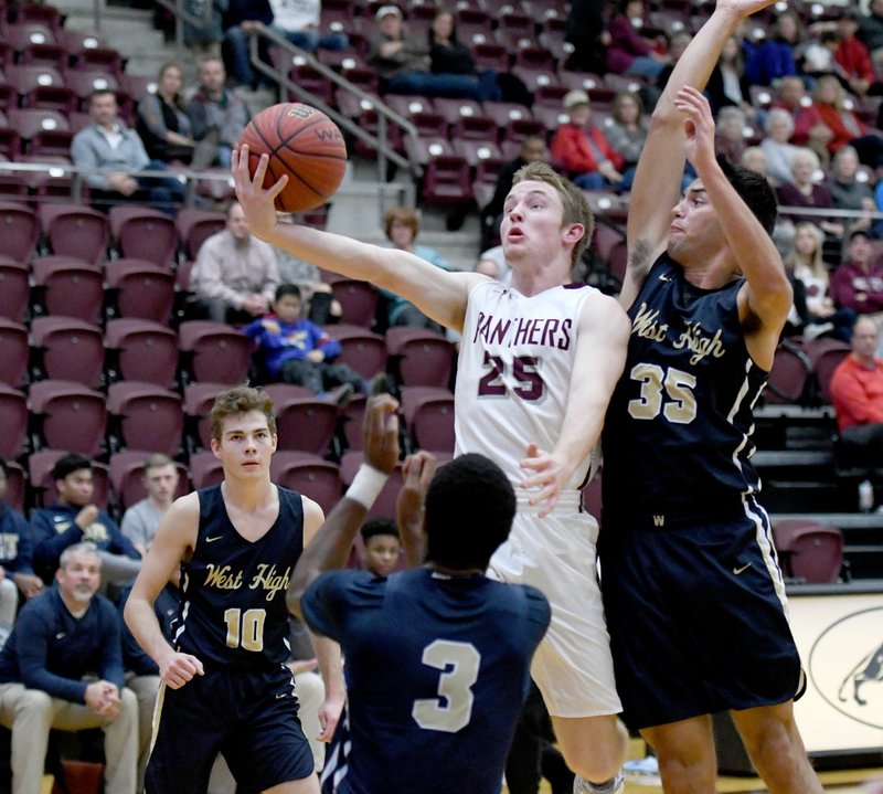 Bud Sullins/Special to the Herald-Leader Siloam Springs senior Jacob Wakefield goes in for a shot against Bentonville West on Dec. 11 at Panther Activity Center. Wakefield and the Panthers host Beebe on Friday to open 5A-West Conference play.