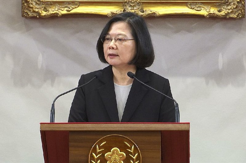“China must face the fact of the existence of Taiwan,” Taiwanese President Tsai Ing-wen says during a news conference Wednesday in Taipei. 