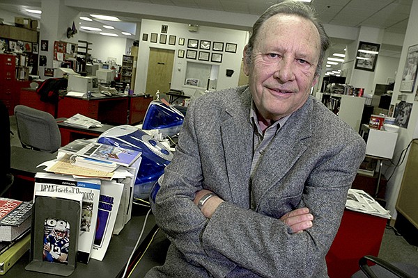 Jim Bailey is shown in the Arkansas Democrat-Gazette newsroom in Little Rock in this January 2003 file photo. Bailey, who covered sports in Arkansas for than a half century and was voted state sports writer of the year 18 times, died on Jan. 2, 2019, due to complications from Alzheimer's. 
