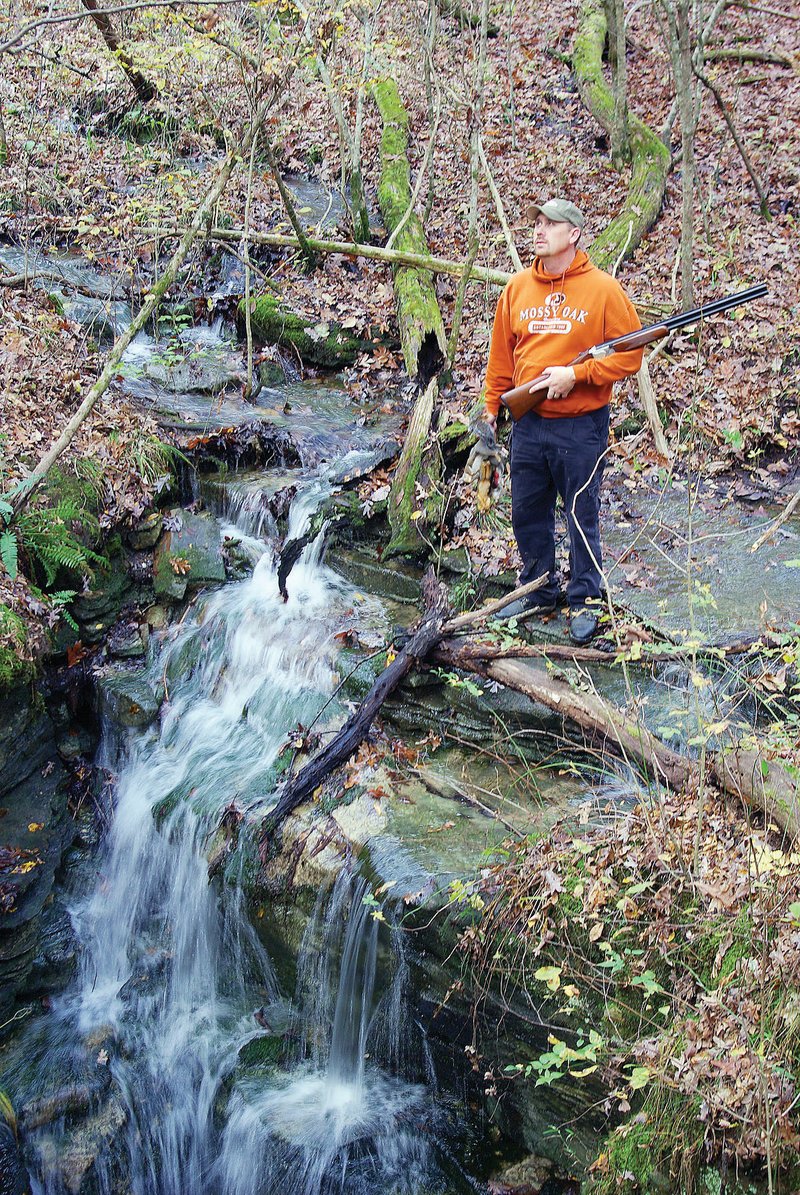 Many who enjoy squirrel hunting, like Josh Sutton of Wynne, savor the experience more when it’s in a scenic locale away from hordes of other hunters.