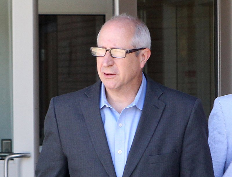 FILE — State Rep. Mickey Gates exits the Garland County Detention Center.
