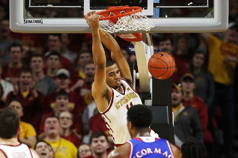 Iowa State guard Talen Horton-Tucker dunks for two points Satur- day during the second half of the Cyclones’ 77-60 victory over No. 5 Kansas at Hilton Coliseum in Ames, Iowa. It was Iowa State’s most lopsided victory over Kansas in 46 years. 