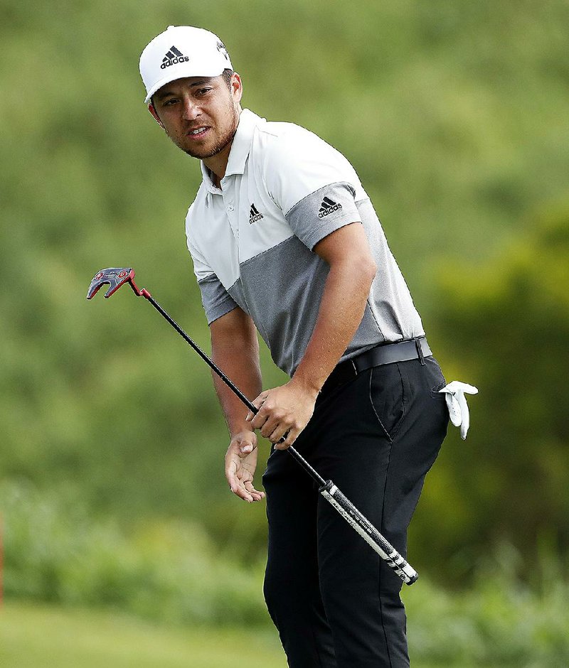 Xander Schauffele tied the Plantation course record with an 11-under 62 to win the Tournament of Champions on Sunday in Kapalua, Hawaii.