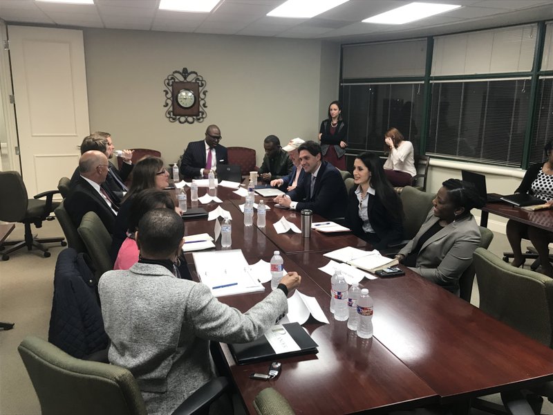 Little Rock Mayor Frank Scott meets with his transition directors on Monday.