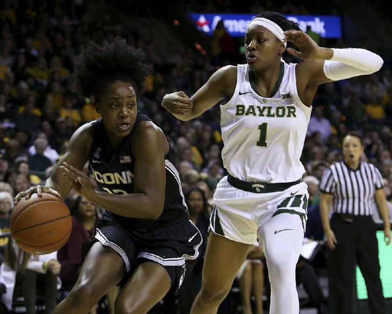 Connecticut freshman Christyn Williams (left), who was a high school All-American at Central Arkansas Christian, will return to Little Rock to face UALR during the 2021-2022 season, the schools announced Tuesday. The Trojans will play at UConn in the fall of 2020.