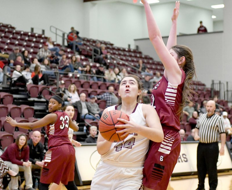 Bud Sullins/Special to the Herald-Leader Siloam Springs sophomore Mia Hevener goes in for a shot against Beebe during last Friday's game. The Lady Panthers hosted Alma on Tuesday. Results were not available at presstime. Siloam Springs plays at Greenbrier this Friday in 5A-West Conference action.