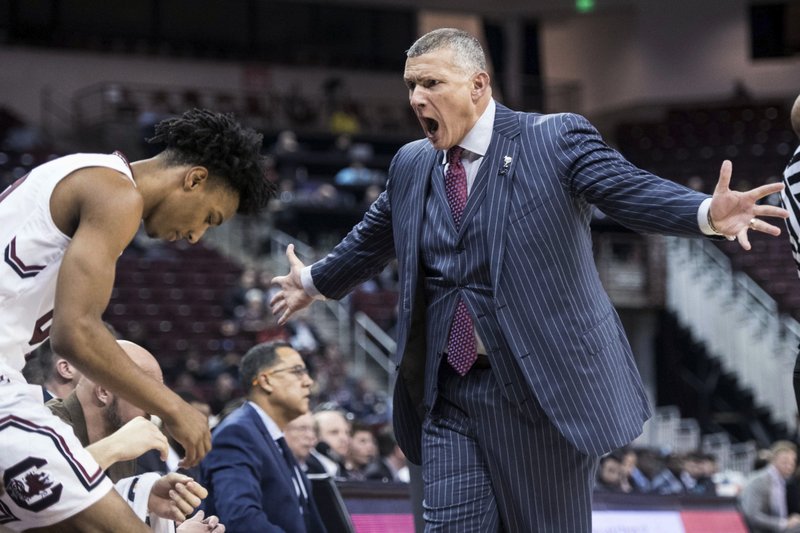 South Carolina coach Frank Martin yells at A.J. Lawson during the first half of the team's NCAA college basketball game against Mississippi State on Tuesday, Jan. 8, 2019, in Columbia, S.C. (AP Photo/Sean Rayford)