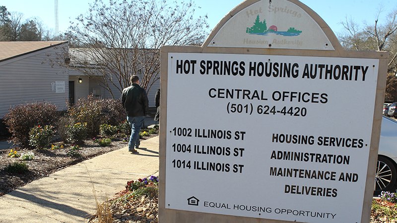 The Sentinel-Record/Richard Rasmussen SECTION 8 UNCERTAINTY: An unidentified man walks toward the Hot Springs Housing Authority’s Illinois Street offices Wednesday. The agency is preparing to notify Section 8 landlords about the possibility of housing-assistance payments being interrupted by the partial government shutdown.