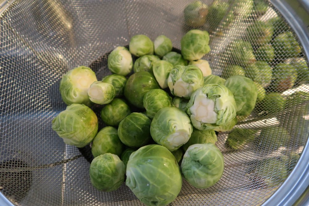 Brussels sprouts cleaned and ready to be sliced.