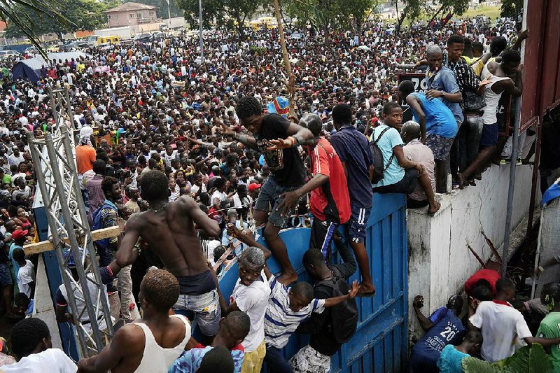 Supporters of Felix Tshisekedi celebrate Thursday outside his headquarters in Kinshasa, Congo. 