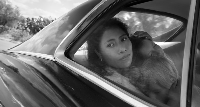 The Associated Press ROMA FILM: This image released by Netflix shows Yalitza Aparicio in a scene from the film "Roma," by filmmaker Alfonso Cuaron. Aparicio portrays Cleo, a domestic worker who works for a woman whose husband abandons her and their four children.
