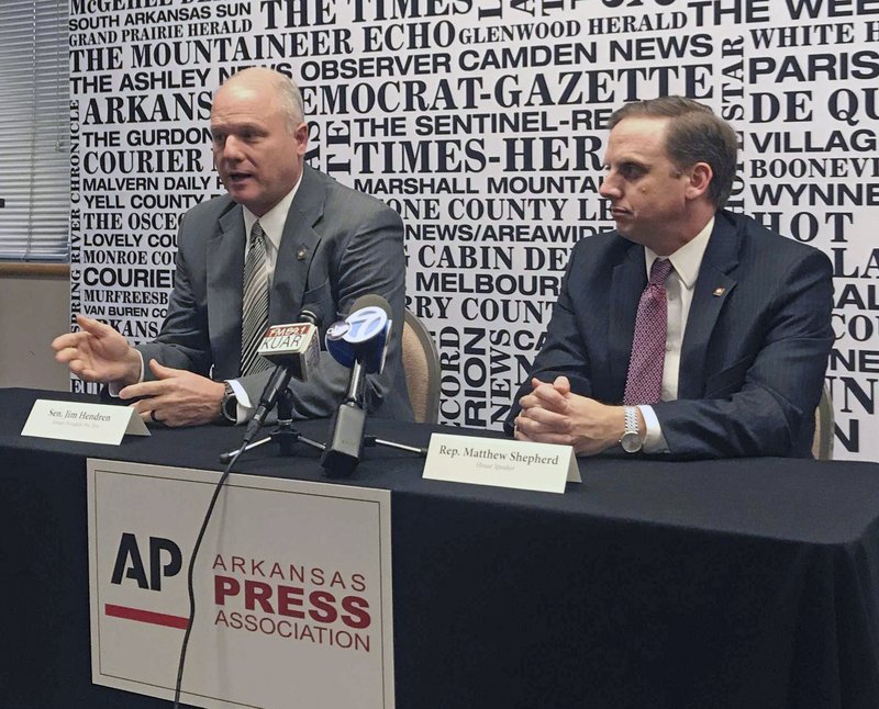 FILE — Senate President Jim Hendren, left, speaks at a forum with House Speaker Matthew Shepherd in Little Rock, Ark., at a forum hosted by The Associated Press and the Arkansas Press Association previewing this year's legislative session on Friday, Jan. 11, 2019. (AP Photo/Andrew Demillo)