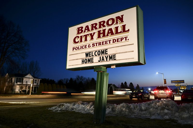 The sign outside Barron, Wis., City Hall, Friday, Jan. 11, 2019, welcomes Jayme Closs, a 13-year-old northwestern Wisconsin girl who went missing in October after her parents were killed. Closs was found alive in the rural town of Gordon, Wis., about about 60 miles north of her home in Barron, authorities said Thursday, Jan. 10. (Aaron Lavinsky/Star Tribune via AP)