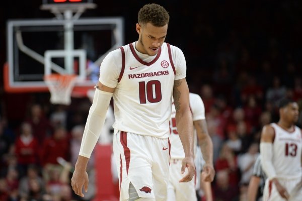 Arkansas forward Daniel Gafford walks to the bench in the closing moments of regulation against LSU Friday, Jan. 11, 2019, during the second half of play in Bud Walton Arena in Fayetteville. Visit nwadg.com/photos to see more photographs from the game.