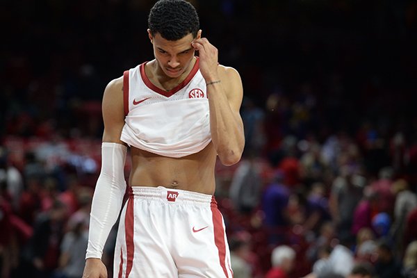 Arkansas guard Jalen Harris walks off the floor following a 94-88 overtime loss to LSU on Saturday, Jan. 12, 2019, in Fayetteville. 