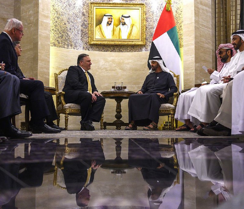 Secretary of State Mike Pompeo sits with Abu Dhabi Crown Prince Sheikh Mohammed bin Zayed Al Nahyan during a meeting Saturday in the United Arab Emirates’ capital. The stop was Pompeo’s fourth on a nine-nation Middle East trip. 