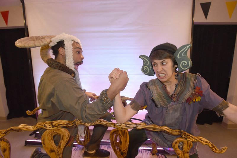 File Photo/FLIP PUTTHOFF David T. Anthony (left) and Jaddy Ciucci demonstrate an arm wrestling scene from "Three Billy Goats Gruff," a recent Trike Theatre production. Winter classes start Jan. 15 at Trike.