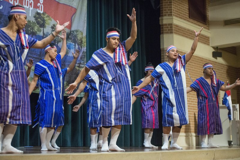 NWA Democrat-Gazette/BEN GOFF &#8226; @NWABENGOFF A group of Karen dancers from Clarksville performs a 'Man dance' Saturday during a Karen new year celebration at The Jones Center in Springdale. The Karen people are an ethnic group native to Southeast Asia.