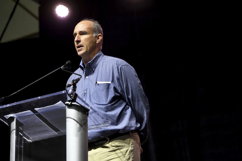 In this Nov. 13, 2018 photo, James Grein tells the audience gathered at the Silence Stops Now rally, at MECU Pavilion in Baltimore, that he was sexually abused for years by ex-Cardinal Theodore McCarrick.