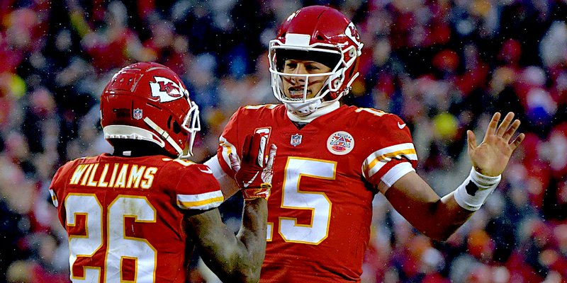 The Associated Press NOT THIS TIME: Chiefs quarterback Patrick Mahomes (15) celebrates a touchdown with running back Damien Williams (26) Saturday during the first half of a 31-13 victory over the Indianapolis Colts in the divisional round of the NFL playoffs in Kansas City, Mo.