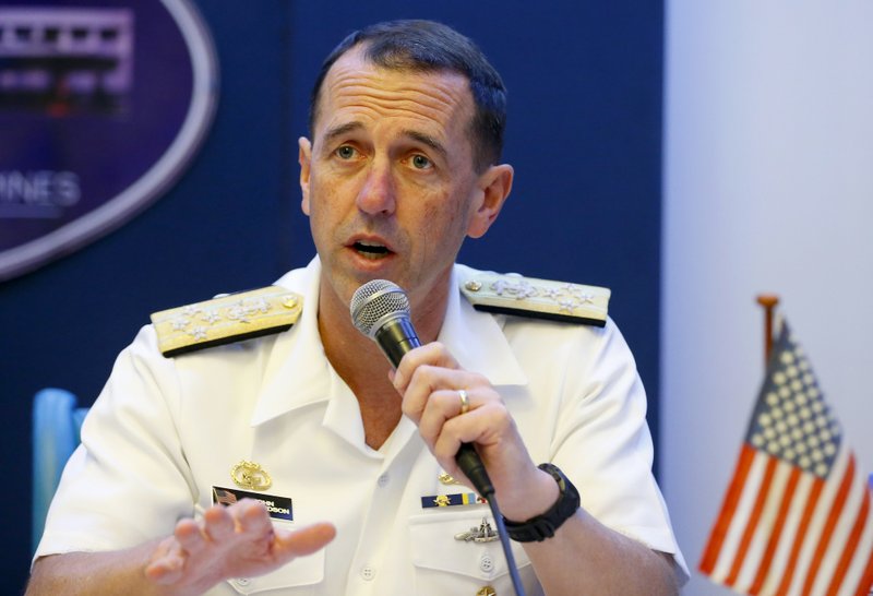 In this Oct. 29, 2018, file photo, Adm. John Richardson, chief of Naval Operations of the U.S. Navy, speaks during a news conference with Philippine Armed Forces Chief Gen. Carlito Galvez Jr., following their meeting at Camp Aguinaldo in suburban Quezon city, Philippines. 