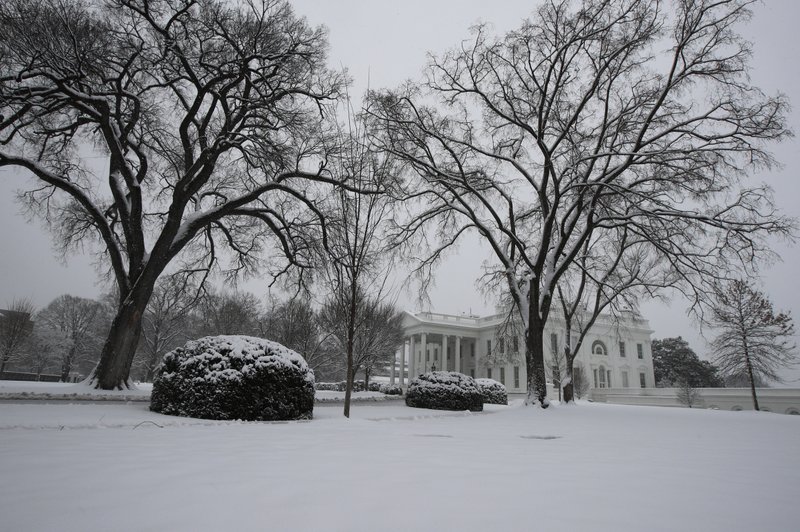 Snow covers the North Lawn of the White House in Washington, Sunday, Jan. 13, 2019. (AP Photo/Manuel Balce Ceneta)