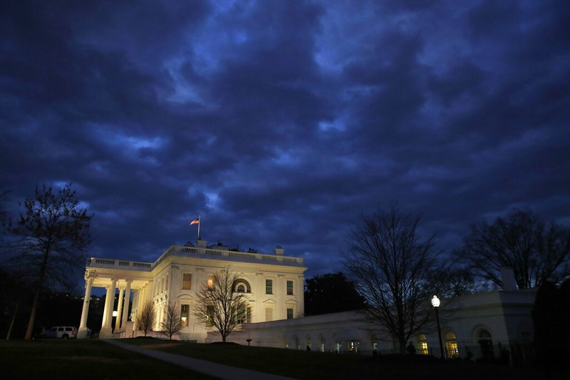 In this Jan. 8, 2019, photo, clouds roll over the White House, Tuesday Jan. 8, 2019, in Washington. The 2020 primary campaign is exploding 13 months before the first voters head to the polls. Candidates and potential candidates are hiring staff and traveling to key states all in a mad scramble to gain a leg up in what will be a rollicking Democratic primary. (AP Photo/Jacquelyn Martin, File)