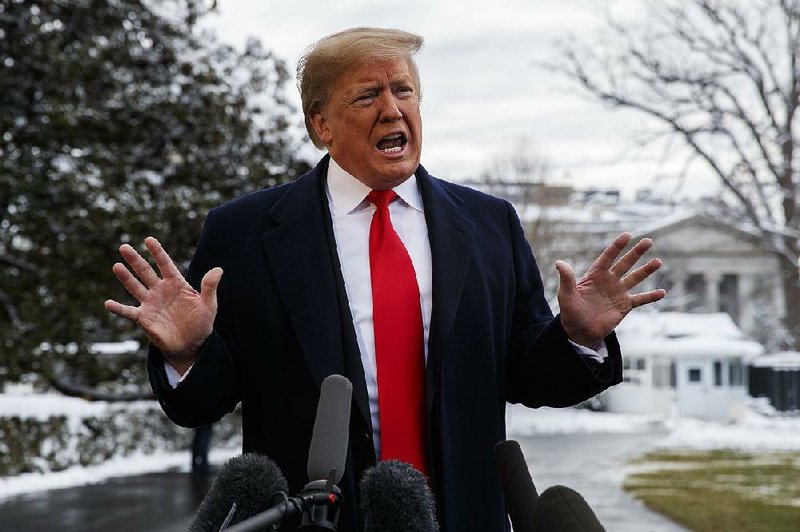 President Donald Trump talks with reporters Monday on the South Lawn of the White House before departing for the American Farm Bureau Federation’s 100th annual convention in New Orleans.