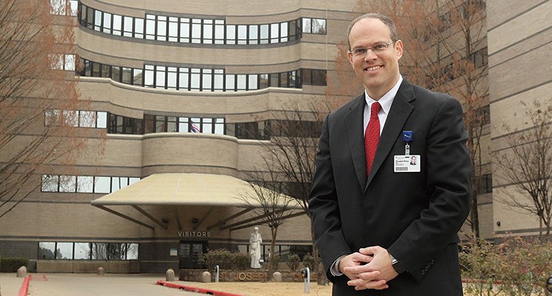 The Sentinel-Record/Richard Rasmussen NEW PRESIDENT: Dr. Doug Ross, chief medical officer for the CHI St. Vincent health system in Arkansas, began his tenure as president of CHI St. Vincent Hot Springs market on Monday. Ross has been with CHI St. Vincent Hot Springs since 2003 and will continue his statewide role in addition to his new role as the hospital's chief administrator.