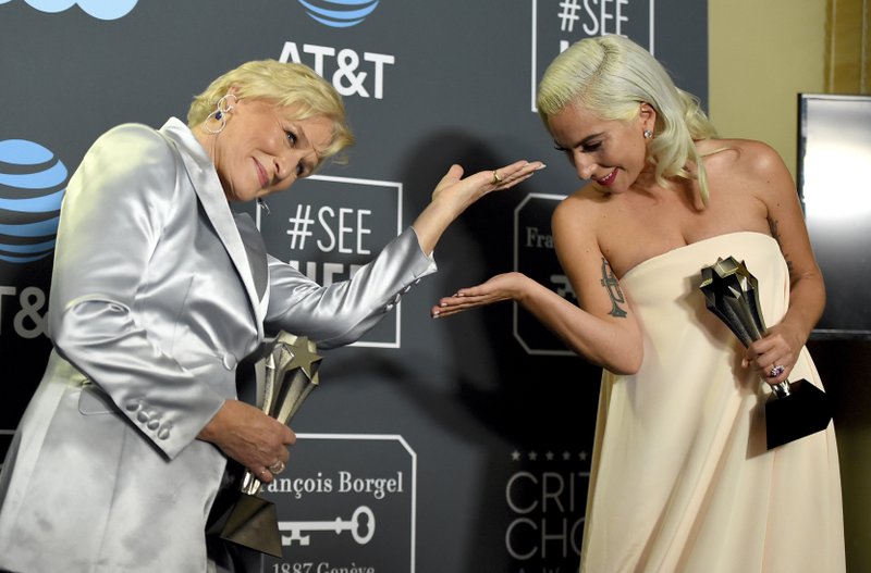 Glenn Close, left, and Lady Gaga, winners in a tie for the best actress award, pose in the press room at the 24th annual Critics' Choice Awards on Sunday, Jan. 13, 2019, at the Barker Hangar in Santa Monica, Calif. Close won for her role in &quot;The Wife&quot; and Lady Gaga won for her role in &quot;A Star Is Born.&quot; (Photo by Jordan Strauss/Invision/AP)