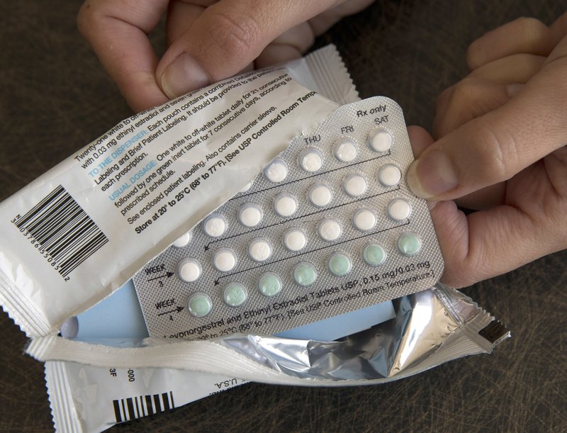 The Associated Press NEW RULES: In this Aug. 26, 2016, file photo, a one-month dosage of hormonal birth control pills is displayed in Sacramento, Calif. A U.S. judge will hear arguments over California's attempt to block new rules by the Trump administration allowing more employers to claim religious objections to providing birth control benefits. The rules set to go into effect on Monday.