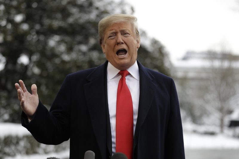 The Associated Press DEPARTING: President Donald Trump talks with reporters on the South Lawn of the White House before departing for the American Farm Bureau Federation's 100th Annual Convention in New Orleans, Monday, in Washington.