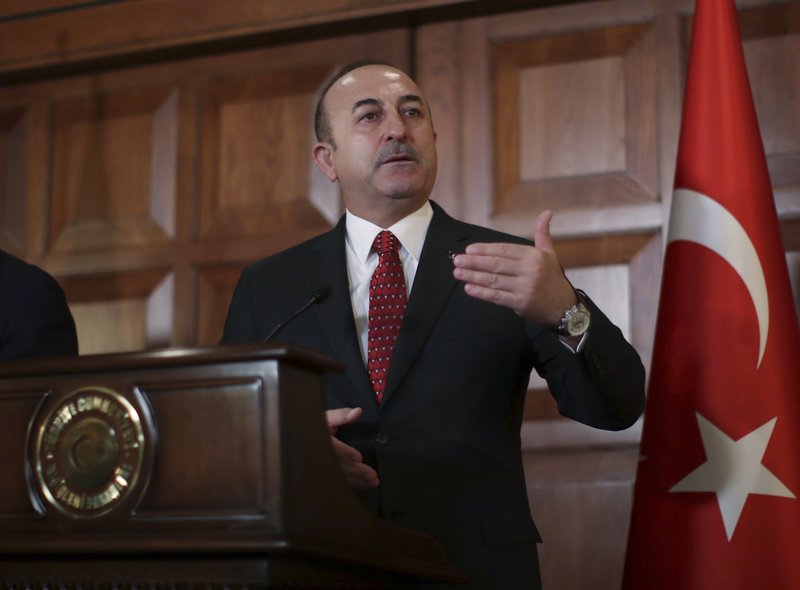 Turkey's Foreign Minister Mevlut Cavusoglu, talks to the media during a joint news conference with Luxembourg's Foreign Minister Jean Asselborn following their meeting in Ankara, Turkey, Monday, Jan. 14, 2019. Cavusoglu responded to U.S. President Donald Trump's threat to devastate Turkey economically if it attacks U.S.-backed Kurdish forces in Syria. Cavusoglu also rebuked Trump for issuing the warning via Twitter saying &quot;strategic partners&quot; do not speak to each other through social media. (Cem Ozdel/Turkish Foreign Ministry via AP, Pool)