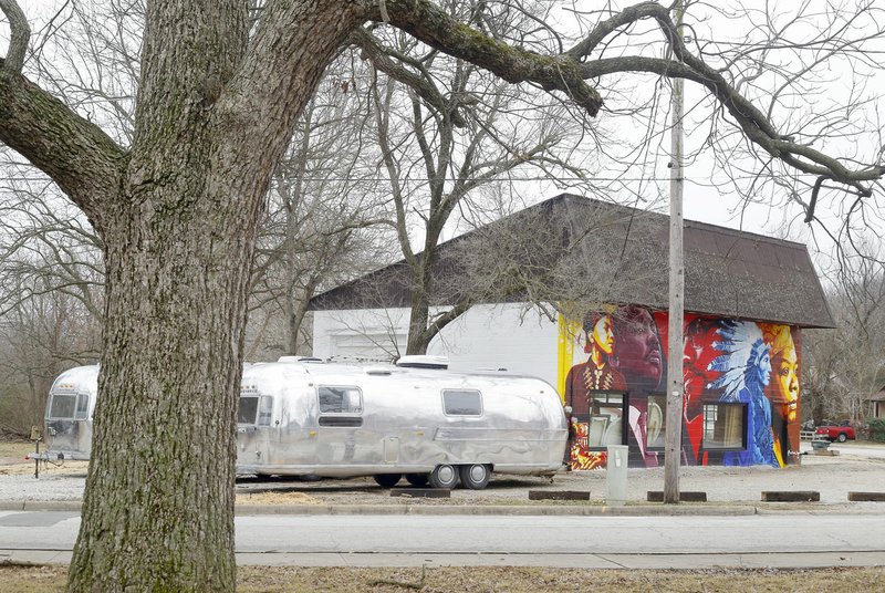 NWA Democrat-Gazette/DAVID GOTTSCHALK The property at 704 S. Washington Ave. is visible Monday in Fayetteville. A request is going through the city to put in nightly rentals of travel trailers on the property.