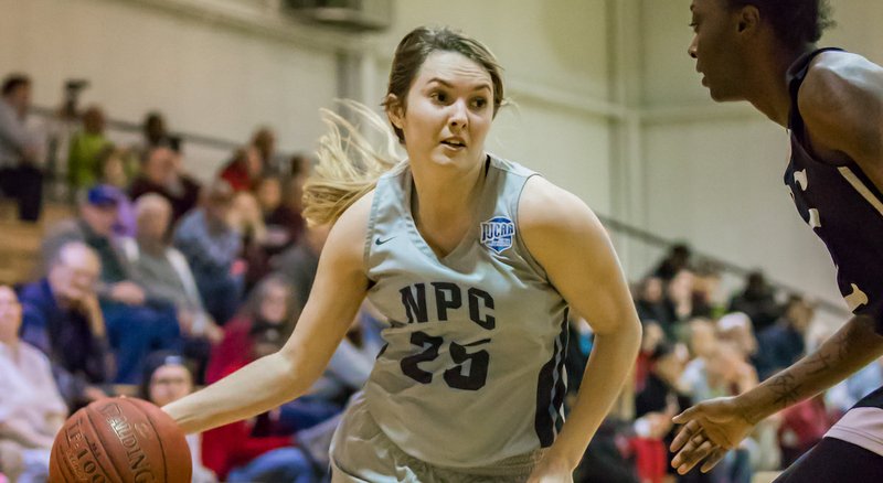 Submitted photo RUNNING POINT: National Park College sophomore point guard Bailey Womack (25) looks for a wide option Monday during the Nighthawks' 70-65 home loss to Arkansas Baptist College. Photo by Aaron Brewer, courtesy of National Park College.