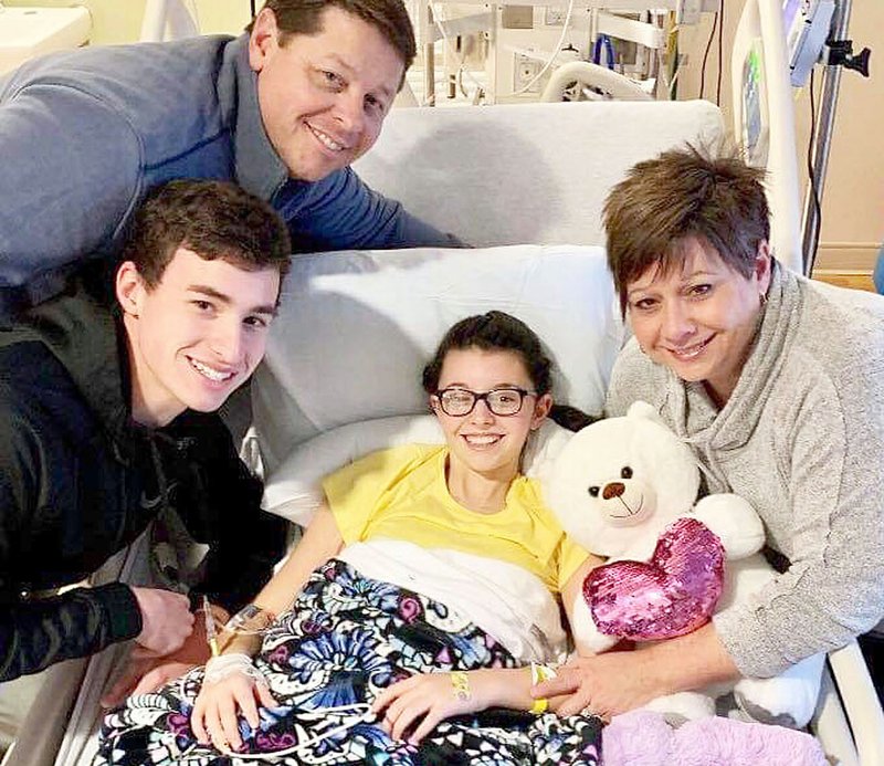 SUBMITTED PHOTO 
Kennedy Allison is recovering at Arkansas Children’s Hospital in Little Rock after passing out at school Friday. Her parents, Keith and Jennifer Allison, and brother Landon are keeping her company.