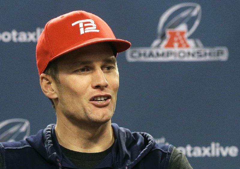 New England Patriots quarterback Tom Brady faces reporters following an NFL football practice, Wednesday, Jan. 16, 2019, in Foxborough, Mass. 