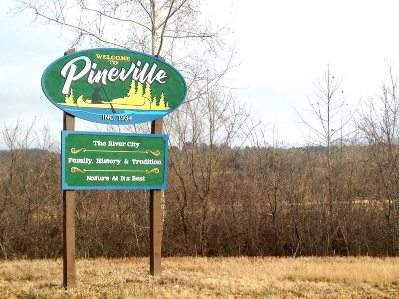 Sally Carroll/McDonald County Press Four signs, such as this one, welcome neighbors and visitors to Pineville. Since the signs were placed about a year and a half ago, officials have had an "overwhelming" response.