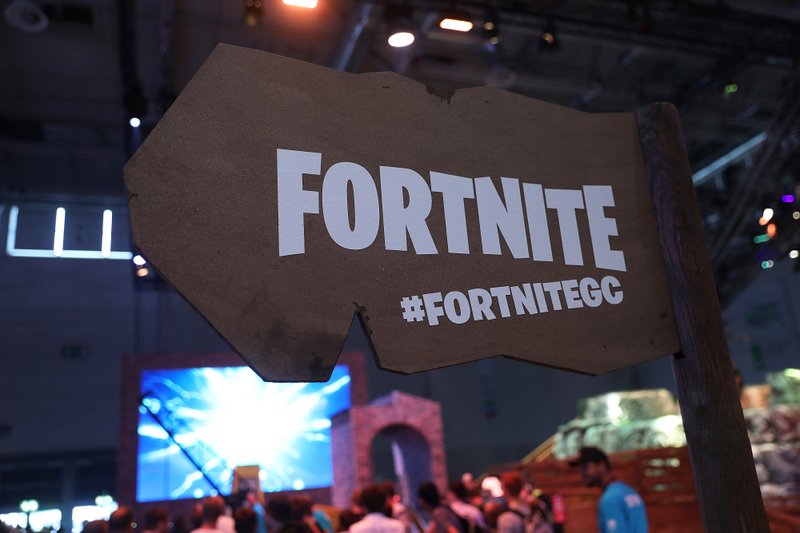 A sign advertises the 'Fortnite' computer game at the Gamescom gaming industry event in Cologne, Germany, on Aug. 21, 2018. Bloomberg photo by Krisztian Bocsi.