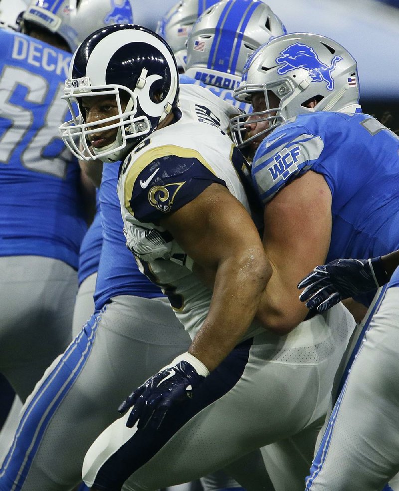 Los Angeles Rams defensive lineman Ndamukong Suh (left) earned his first postseason victory Saturday against the Dallas Cowboys. Suh and the Rams travel to New Orleans on Sunday for the NFC Championship Game.