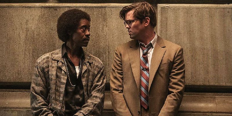 Don Cheadle and Andrew Rannells star in Black Monday, a half-hour comedy set on Wall Street in the 1980s which premieres on the Showtime platform this weekend. 