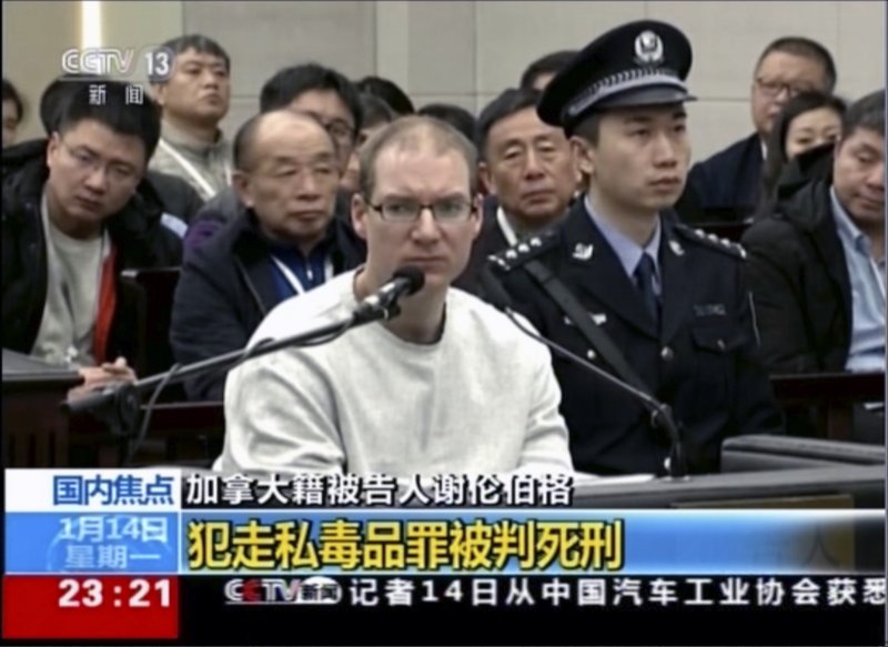 In this image taken from a video footage run by China's CCTV, Canadian Robert Lloyd Schellenberg attends his retrial at the Dalian Intermediate People's Court in Dalian, northeastern China's Liaoning province on Monday, Jan. 14, 2019. A Chinese court sentenced the Canadian man to death Monday in a sudden retrial in a drug smuggling case that is likely to escalate tensions between the countries over the arrest of a top Chinese technology executive. (CCTV via AP)