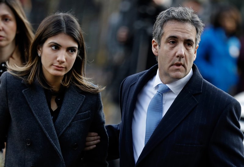 Michael Cohen, former personal lawyer to U.S. President Donald Trump, arrives at federal court with his daughter Samantha Cohen, left, in New York on Wednesday, Dec. 12, 2018. MUST CREDIT: Bloomberg photo by Peter Foley