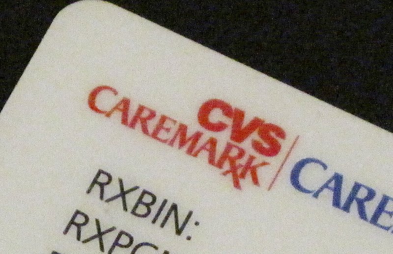 In this May 1, 2009 file photo, a CVS Caremark user card is shown in New York. Walmart is going to continue to participate in the CVS Caremark pharmacy benefit management commercial and managed Medicaid retail pharmacy networks. Financial terms of the multi-year deal were not disclosed. (AP Photo/Chris Hatch)