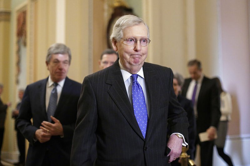 In this Jan. 15, 2019, photo, Senate Majority Leader Mitch McConnell, R-Ky., arrives to speak to reporters following a weekly policy meeting on Capitol Hill in Washington. One of McConnell's guiding principles is: "There's no education in the second kick of a mule." Now, deep in a government shutdown he wanted President Donald Trump to avoid, McConnell is not about to be kicked again. (AP Photo/J. Scott Applewhite)