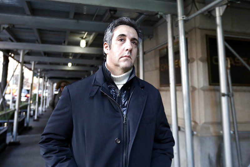 In this Dec. 7, 2018 file photo, Michael Cohen, former lawyer to President Donald Trump, leaves his apartment building in New York. A report by BuzzFeed News, citing two unnamed law enforcement officials, says that Trump directed Cohen to lie to Congress and that Cohen regularly briefed Trump on the project. The Associated Press has not independently confirmed the report. (AP Photo/Richard Drew, File)