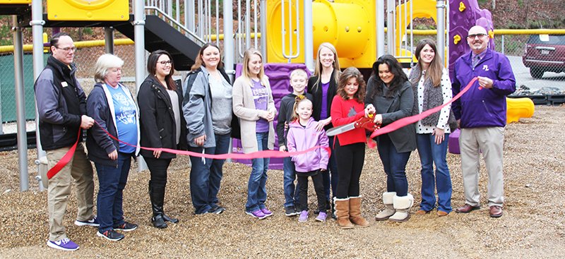 The Sentinel-Record/Tanner Newton

PLAY TIME: Lauren and Alix Butler cut the ribbon for the updated playground at Fountain Lake Elementary School Friday morning. Joining them are Assistant Principal Steve Freeman, Linda Alexander, Jessica Robertson, Jennifer Hogue, Catherine Holland, Peyton Hardwood, Jalynn Hardwood, Lyndsey Hardwood, Principal Katie Curry and Superintendent Michael Murphy. The Fountain Lake Parent Teacher Organization raised money for this project for four years.