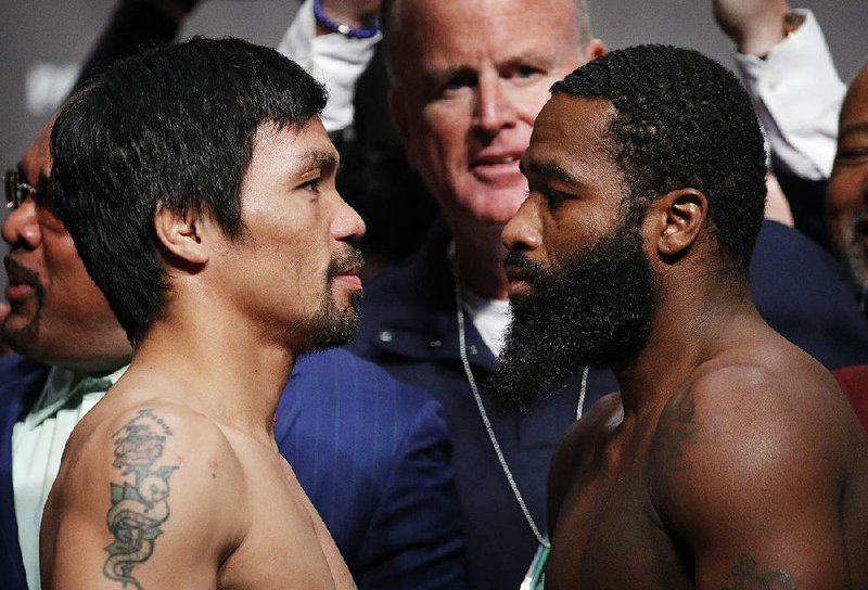 Manny Pacquiao (left) will meet Adrien Broner in a welterweight championship bout today in Las Vegas. 