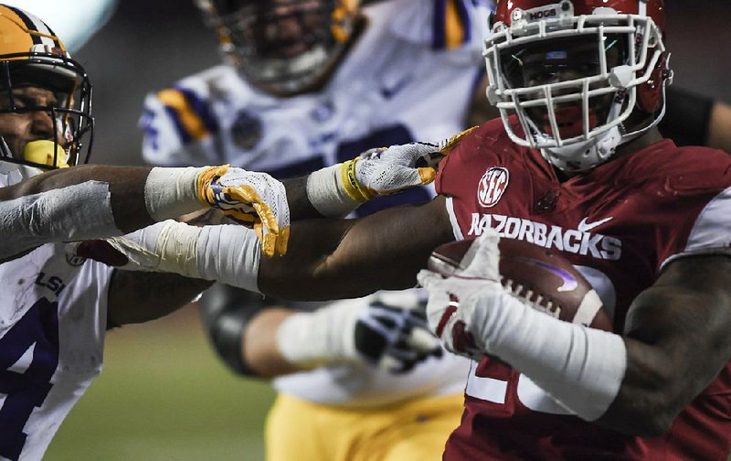 Arkansas Razorbacks linebacker Dre Greenlaw (right) will compete for the North squad in the Senior Bowl on Jan. 26 in Mobile, Ala. 